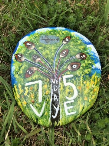 Painted stone showing VE Day tree