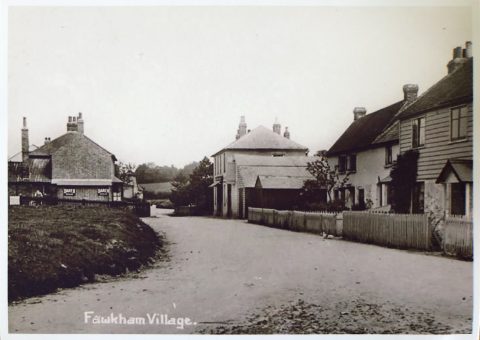 postcard of village showing old cottages