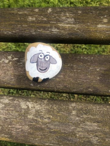 sheep painted on a rock