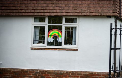 pictures of rainbow in a window