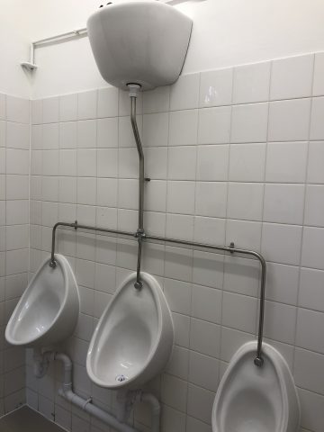 three urinals in gents loo